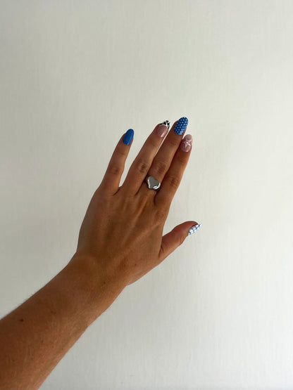 LOVIE ring, bold silver heart-shaped statement ring for men and women, timeless and playful design.