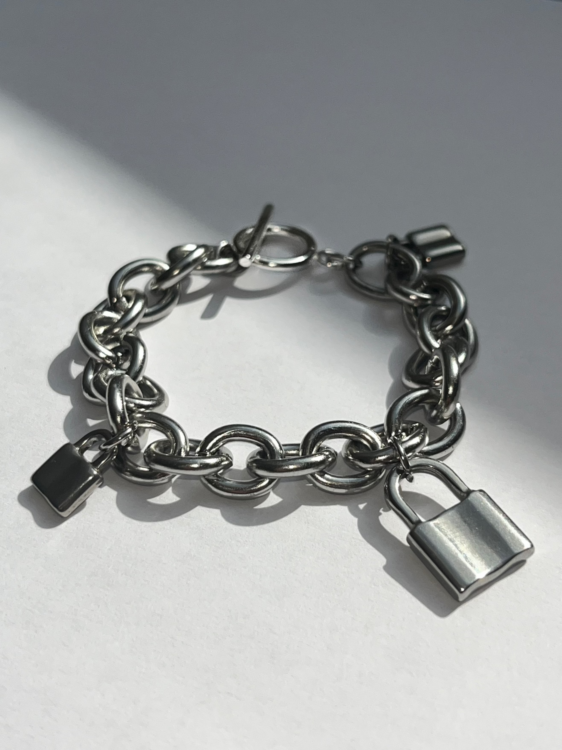 still product image of unisex chunky padlock link bracelet in silver stainless steel, water and sweat proof