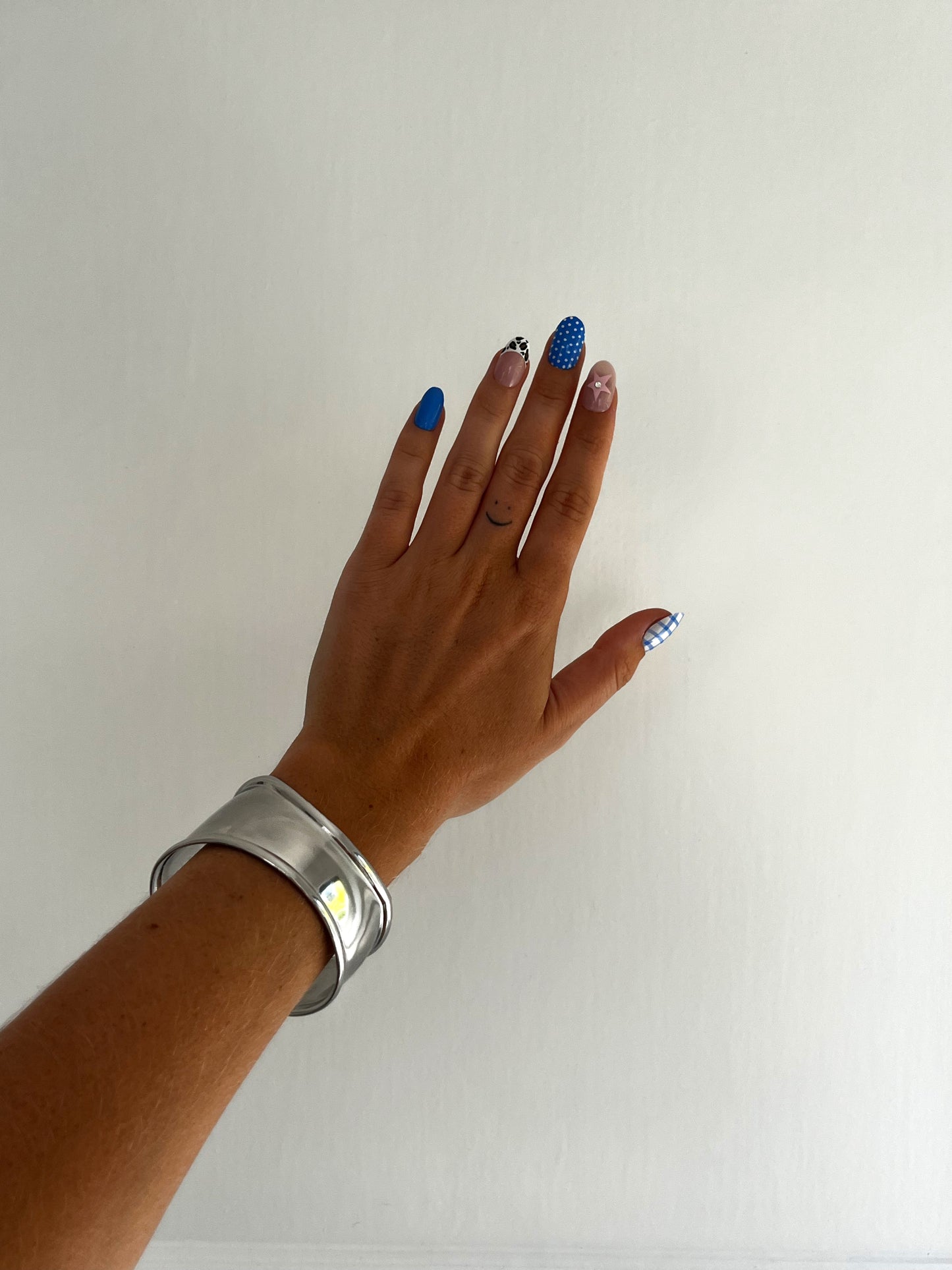 THE ABBIE BANGLE, sleek polished stainless steel sculptural bracelet, unisex statement jewelry