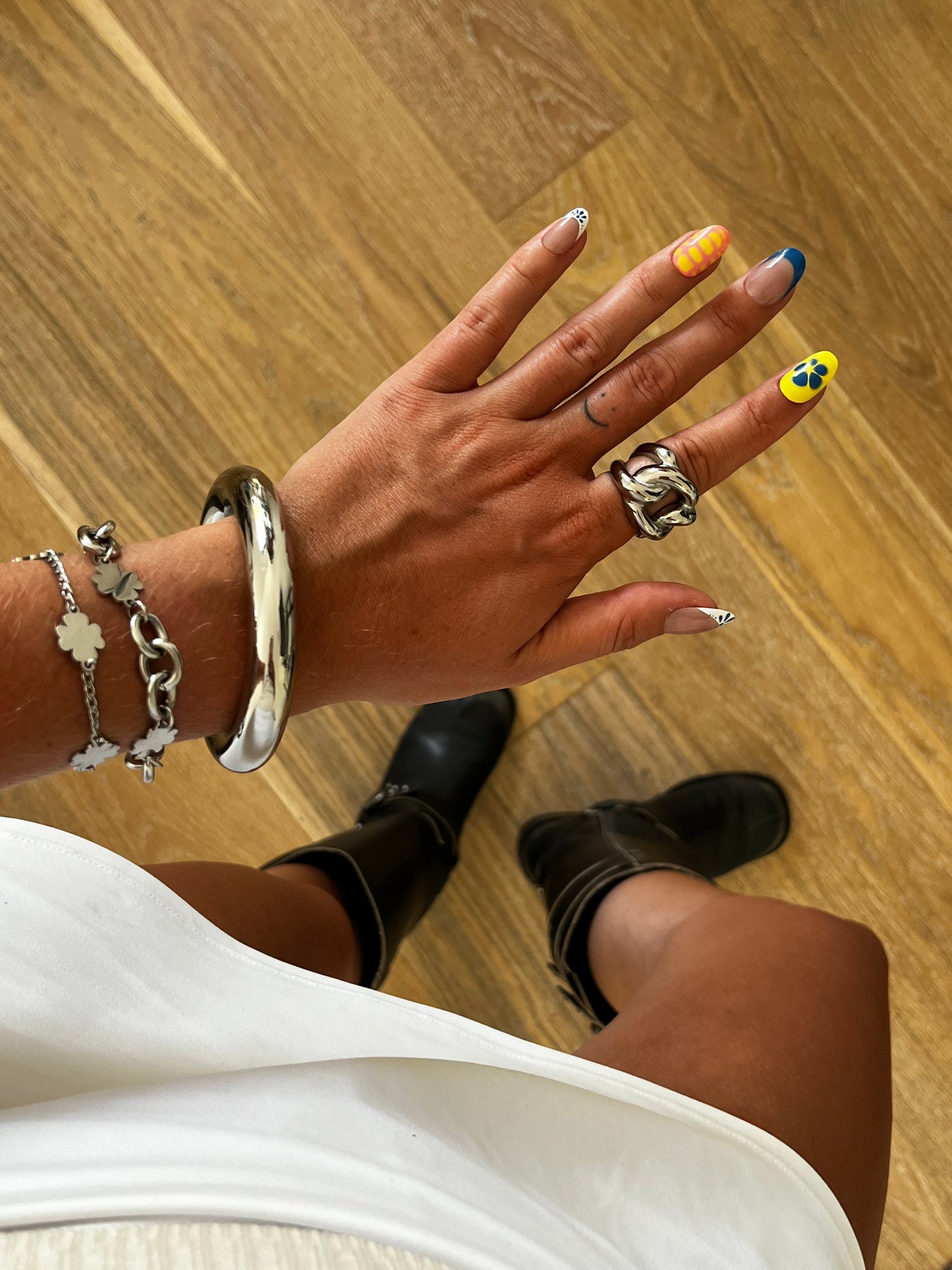 THE CHUNKER ring, chunky interlocked loops in high-polish stainless steel, bold unisex statement jewelry