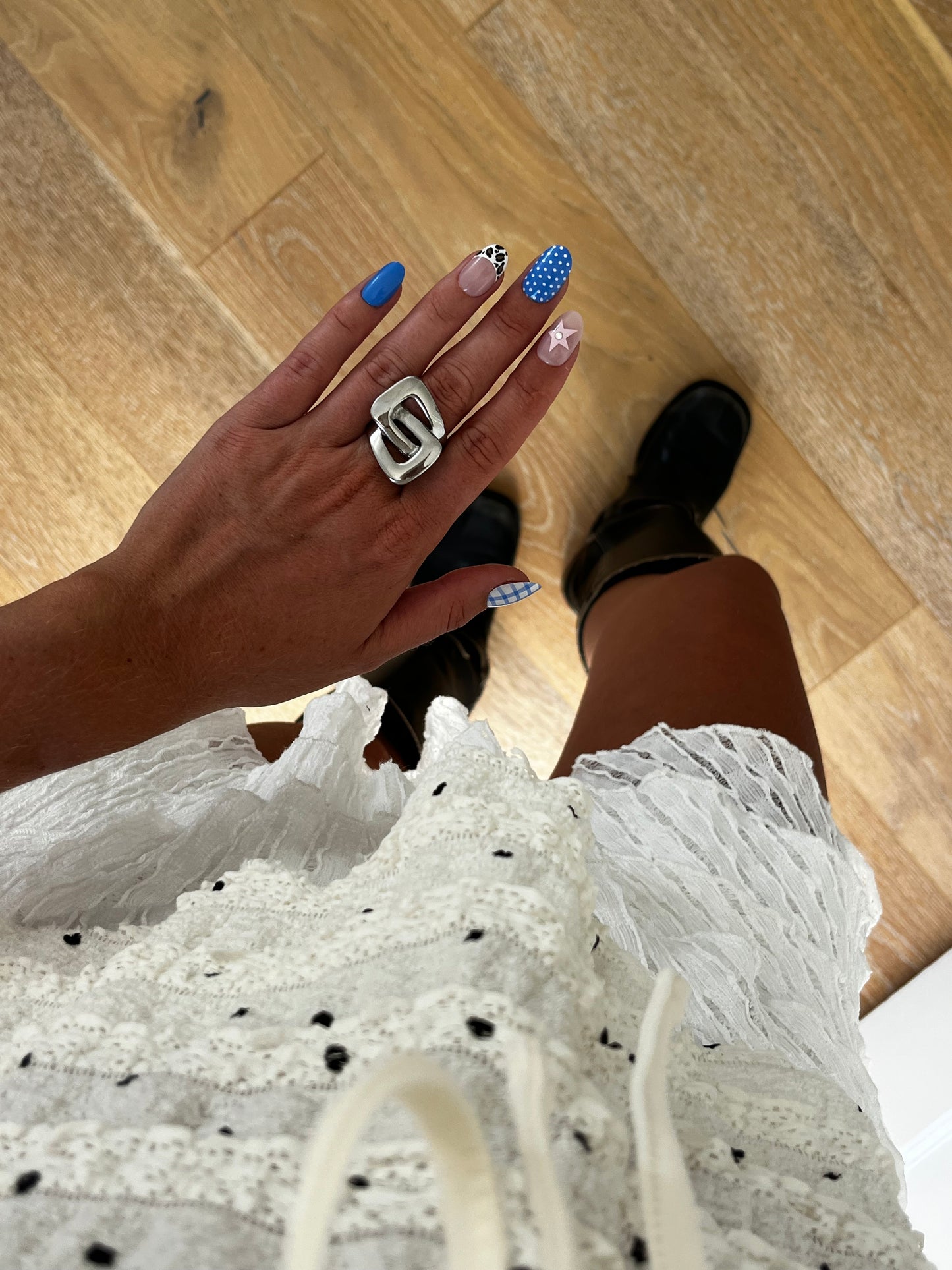 Top view of THE KARL cut-out geometric stainless steel ring, chunky unisex statement jewelry.