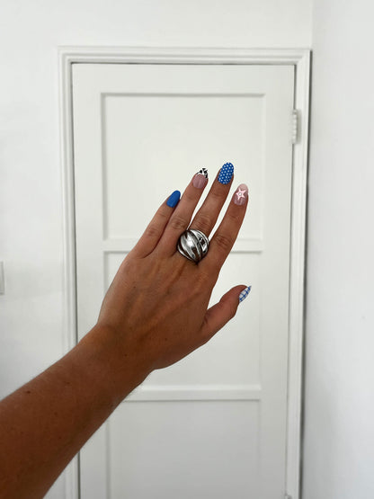 THE WHORL ring, bold twisted stainless steel silver statement ring with fluid curves for men and women